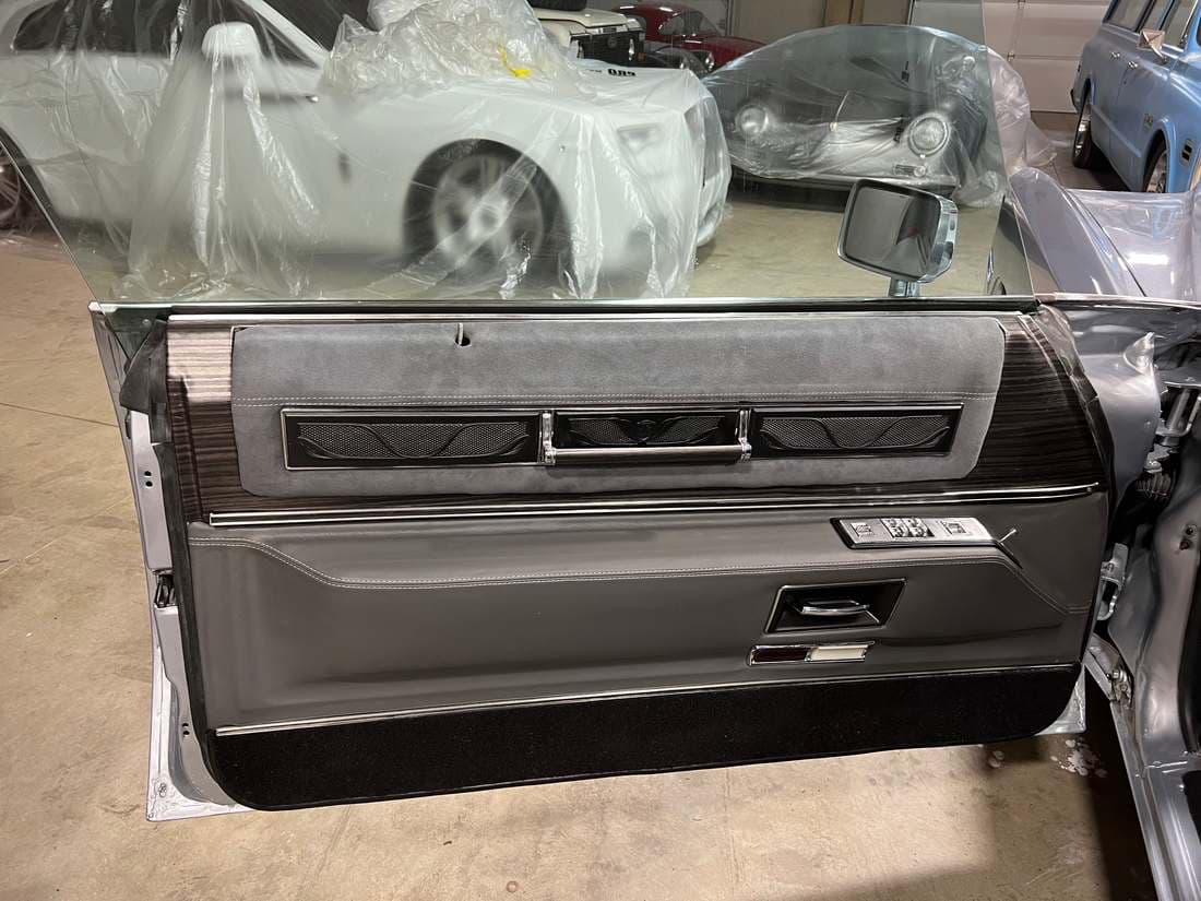 REASSEMBLY — DOOR PANEL